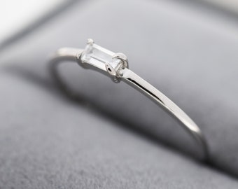 Single baguette shop diamond ring