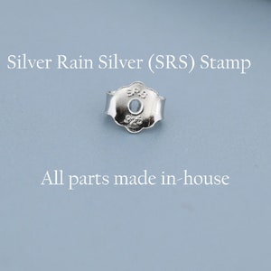 May include: A silver earring back with a scalloped edge and a central hole. The metal surface features the stamped text SRS and 925. The image includes the text Silver Rain Silver (SRS) Stamp and All parts made in-house.