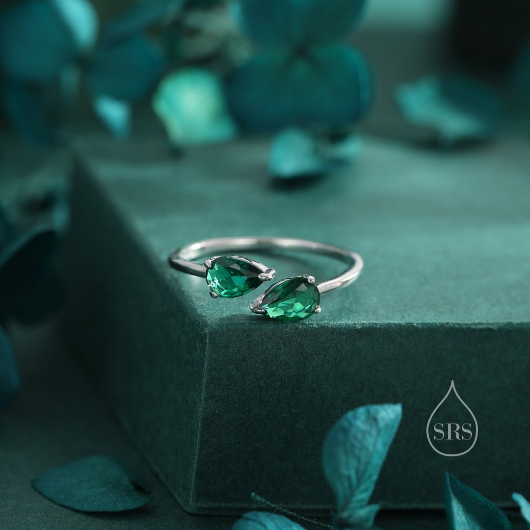 Toi et Moi peergeslepen smaragdgroene open ring in sterlingzilver
