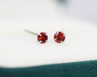 Small red stud best sale earrings