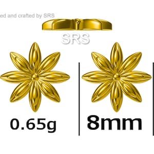 May include: A pair of gold-colored flower-shaped earrings. Each earring is 8 mm in diameter and weighs 0.65 grams. The earrings are designed and crafted by SRS.