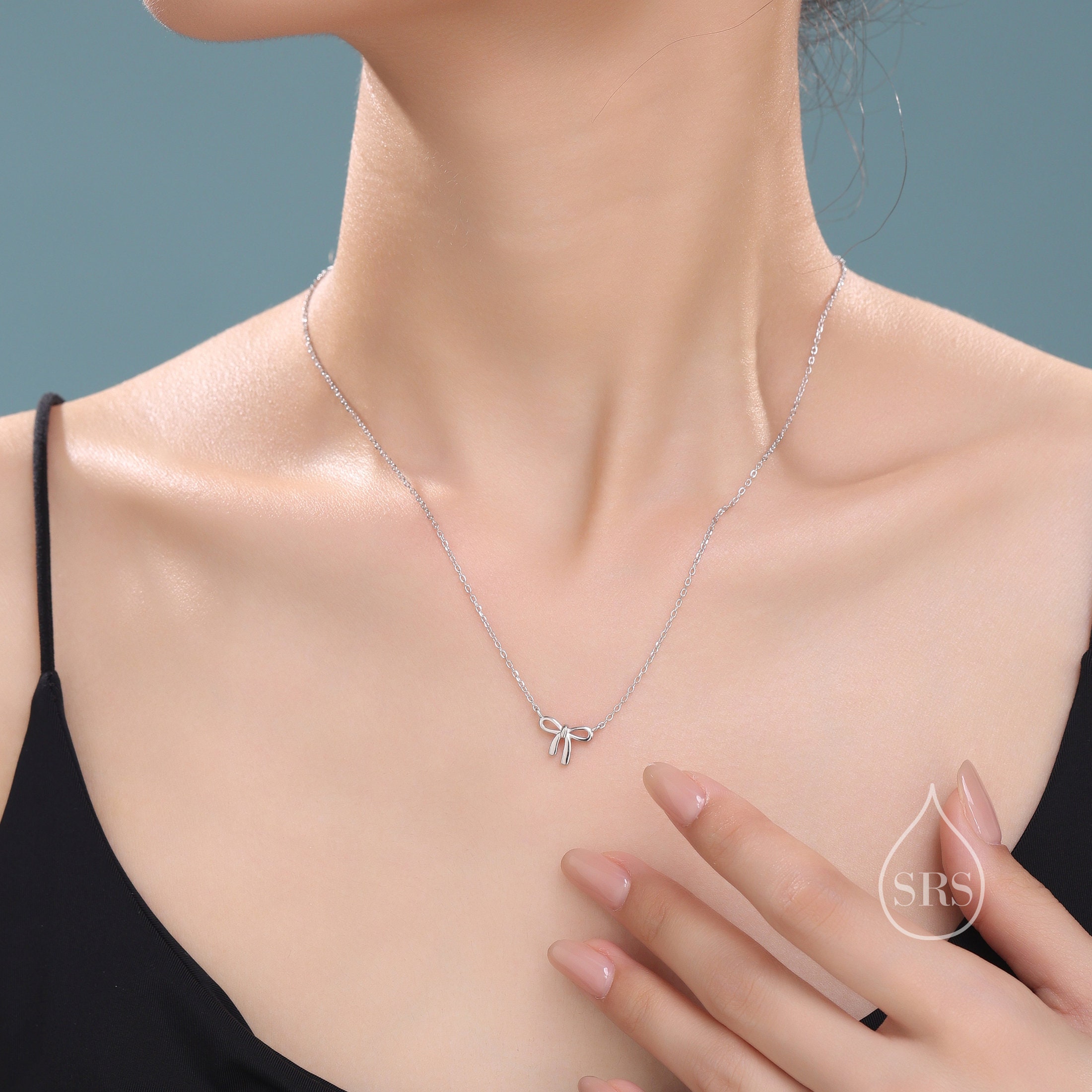Tiny and Delicate Ribbon Bow Pendant Necklace in Sterling