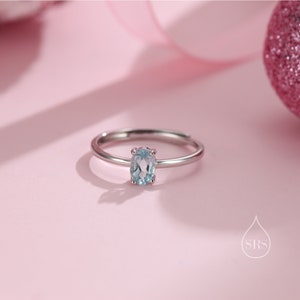 Natural Blue Topaz Oval Ring in Sterling Silver,  4x6mm, Prong Set Oval Cut, Adjustable Size, Genuine Topaz Ring