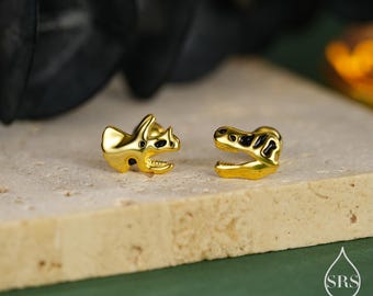 左右非対称の恐竜化石モチーフ 18G スクリューバックピアス