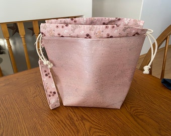 Pink with gold fleck cork project bag with wrist strap