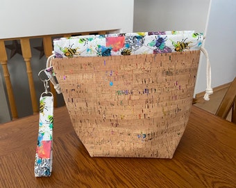 Natural rainbow fleck cork project bag with wrist strap