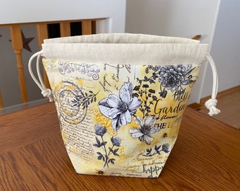 Yellow and grey flower/bee sock sack drawstring bag