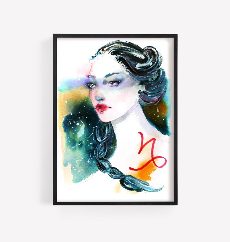 May include: Watercolour painting of a woman with long dark hair and a red Capricorn zodiac symbol on her shoulder. The background is a colourful abstract design with blue, green, and yellow hues.