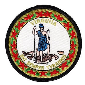 May include: A circular embroidered patch featuring the official seal of the Commonwealth of Virginia. The seal depicts a blue-clad figure standing on a fallen figure, holding a spear and a sword. The text "SIC SEMPER TYRANNIS" and "VIRGINIA" are visible around the figures.