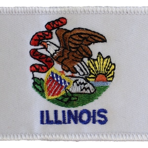 May include: White embroidered patch with the state seal of Illinois. The seal features a bald eagle with a shield, a rising sun, and the words "State of Illinois". The word "ILLINOIS" is embroidered in blue below the seal.