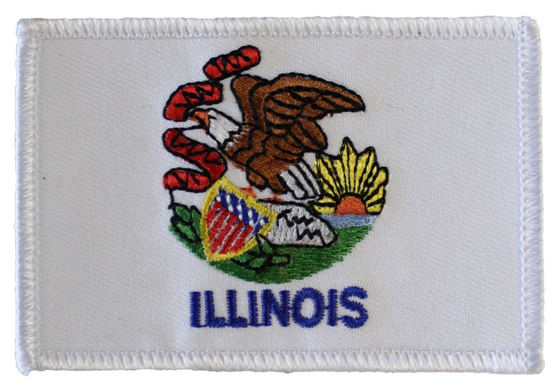 May include: White embroidered patch with the state seal of Illinois. The seal features a bald eagle with a shield, a rising sun, and the words "State of Illinois". The word "ILLINOIS" is embroidered in blue below the seal.
