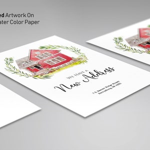 May include: A watercolour illustration of a red house with a green wreath around it. The text "WE HAVE A NEW ADDRESS" is written below the house. The address "75. Sawyer Ridge Street, Perryville, OR 97071" is written below the text.