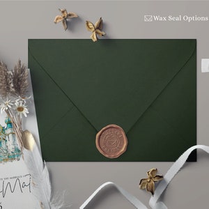May include: A green envelope with a wax seal featuring a brown heart with a small building inside. The wax seal is labeled "Positive Post".