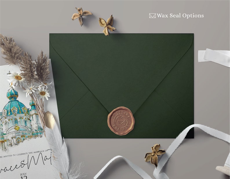 May include: A green envelope with a wax seal featuring a brown heart with a small building inside. The wax seal is labeled "Positive Post".