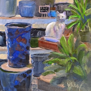 May include: An oil painting depicts a blue and white ceramic pot with a floral design, a white cat statue, and green plants. The artwork has a rustic, impressionistic style, with visible brushstrokes and a warm color palette.