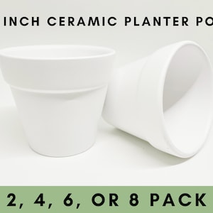 May include: Two white ceramic planter pots, 3 inches in diameter, on a white background.  The text "3 INCH CERAMIC PLANTER POT" is at the top of the image. The text "2, 4, 6, OR 8 PACK" is at the bottom of the image.