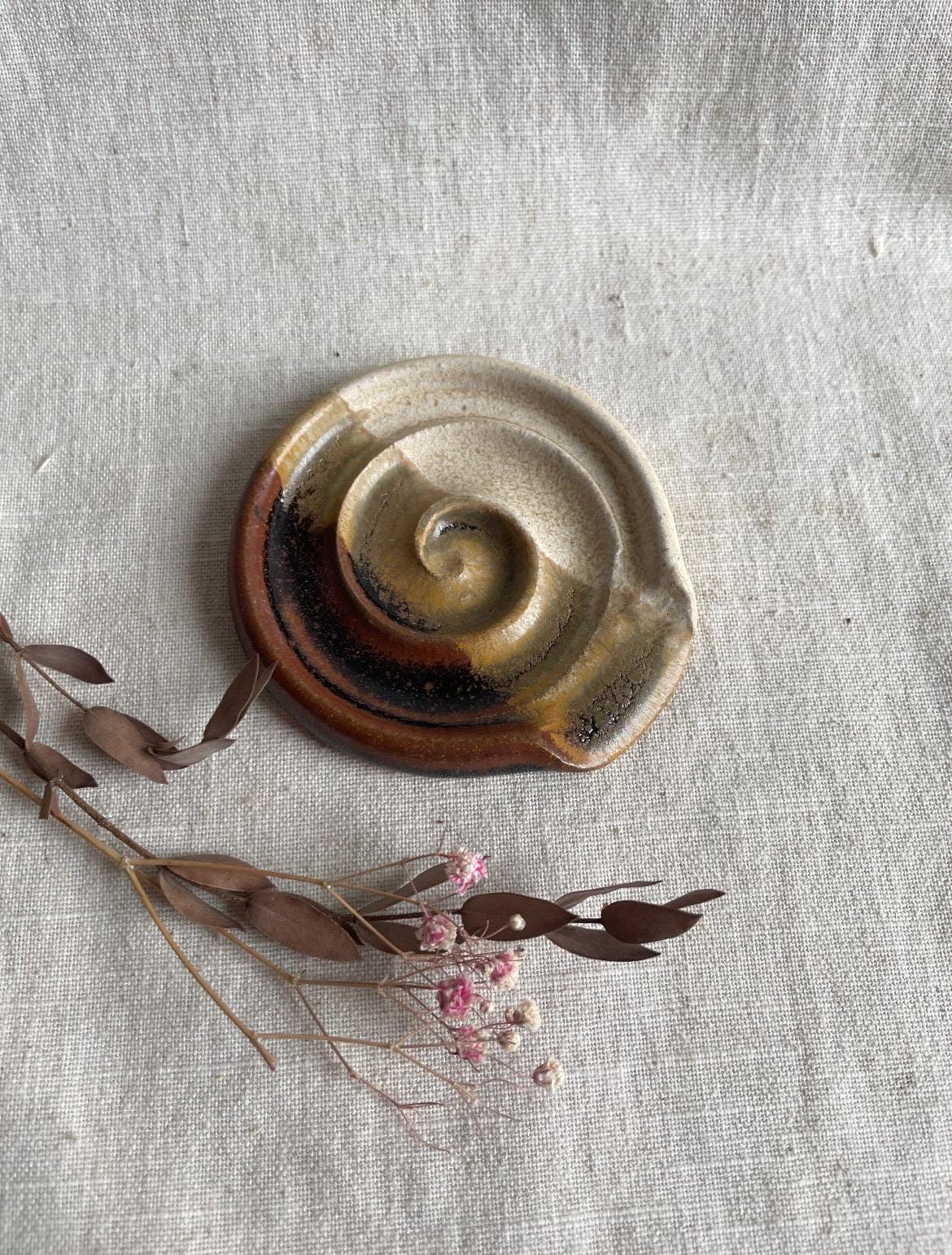 Mini Sandstorm ceramic spoon rest, cream kitchen decor, cream and red spoon rest, spring home design, spiral spoon rests.