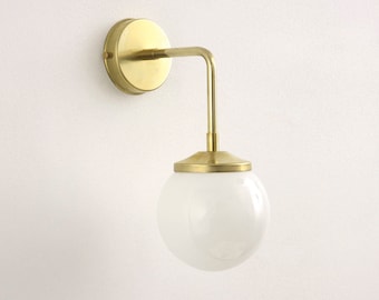 Bold as Brass Wall light with Opal glass shade