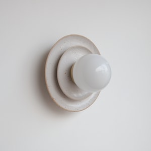 White Disc Aureole Ceramic Wall light