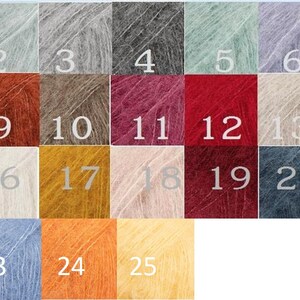 May include: A color chart of 25 yarn colors. The colors are arranged in rows of five. The colors include green, gray, light blue, red, brown, orange, yellow, and pink.