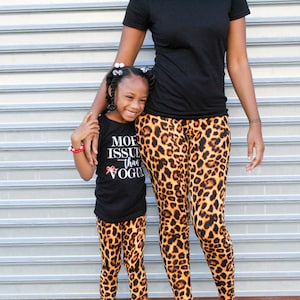 mother and daughter matching leopard outfits