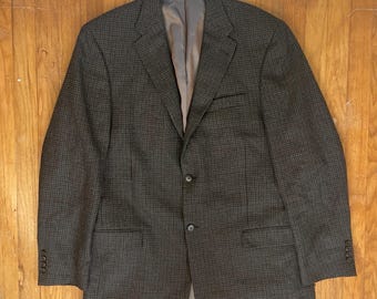 May include: A gray and black checkered blazer with a single button closure.