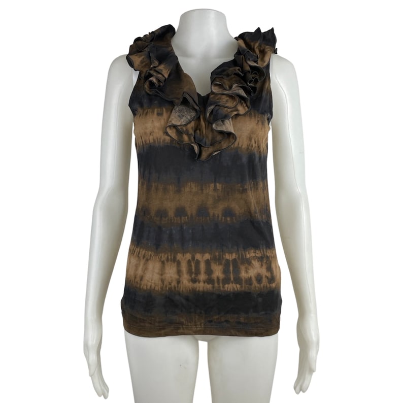 May include: A sleeveless brown and black tie-dye tank top with a large ruffled neckline.