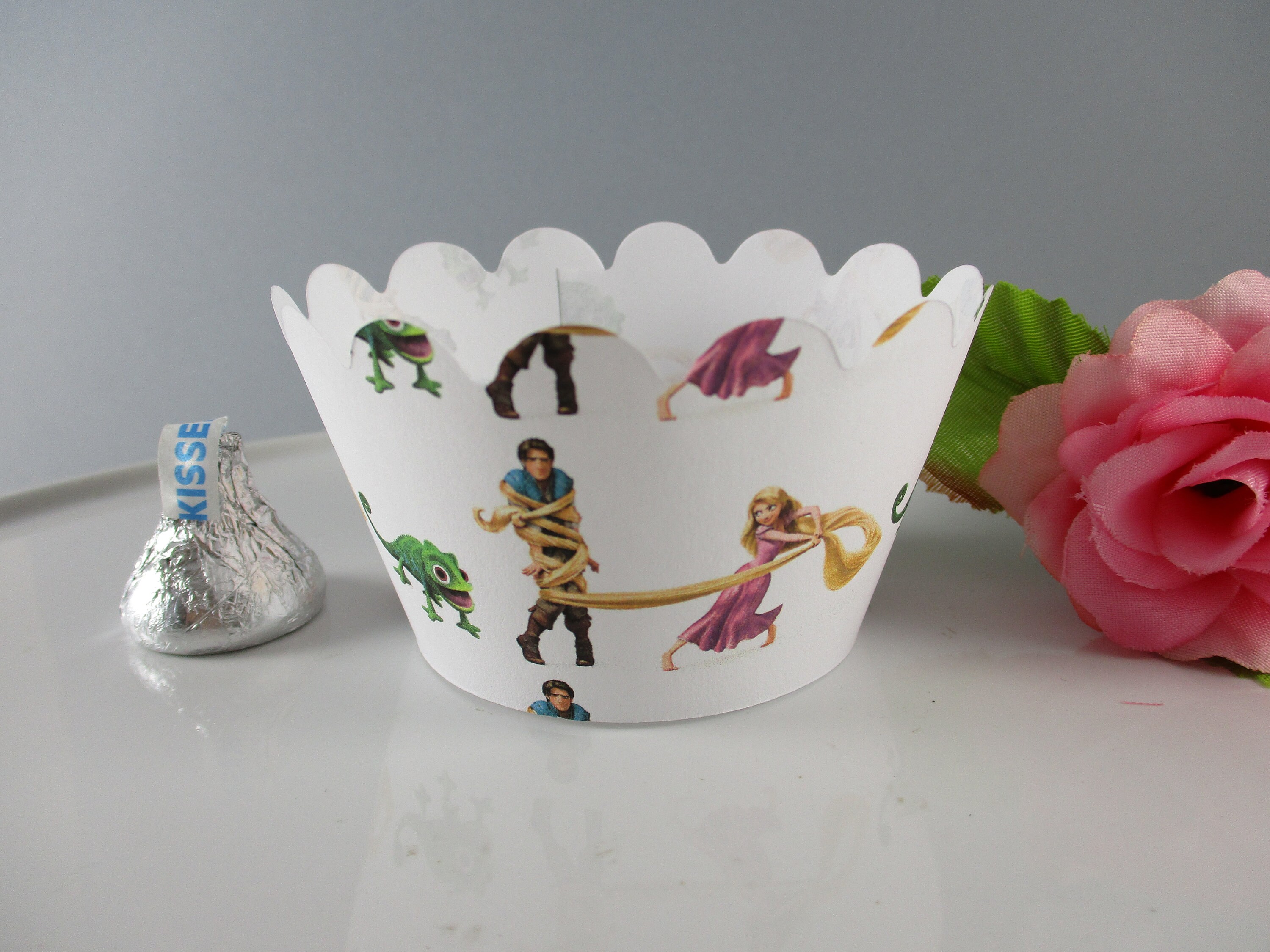 Rapunzel cupcake wrappers Tangled cupcake wrappersPrincess Rapunzel birthday theme