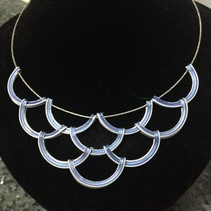 Necklace with Nespresso coffee capsules