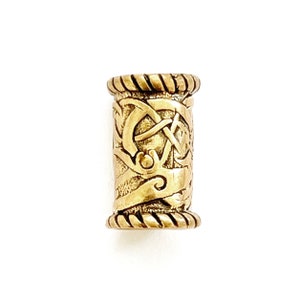Könnte beinhalten: Goldfarbener Metall-Haarperle mit einem geflochtenen Seil-Design und komplizierten Knoten.