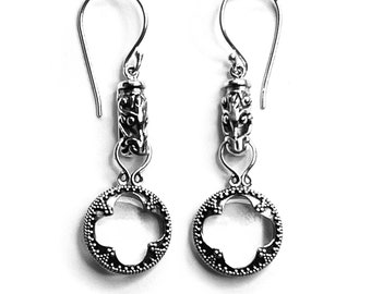 GOTLAND DRAGONHEADS lens EARRINGS - mountain crystal and silver (handmade by Viking Kristall)