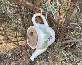 Soft tones of berries on this one of a kind bird home.