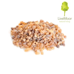 May include: A close-up of a pile of brown and amber resin pieces. The resin is a natural product and is often used in incense and aromatherapy.