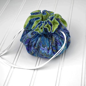 Travel Jewelry Pouch,  Drawstring Jewelry Bag with Pockets, Portable Jewelry Organizer for Trips