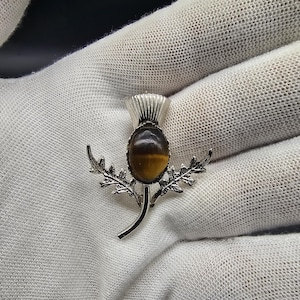 vintage scottish sterling silver brooch scottish thistle faux tiger eye ward brothers 30mm wide brown silver