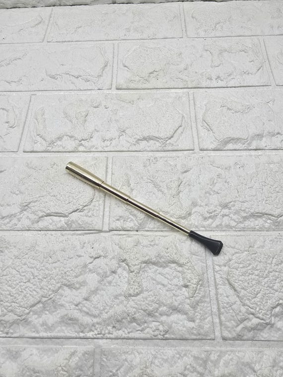 cigarette thin and long White Thin Cigarette Close-up On Windowsill Stock Photo 2309839957