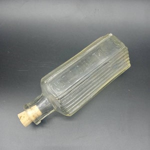 Antique clear glass poison bottle not to be taken ntbt hexagonal 13cm