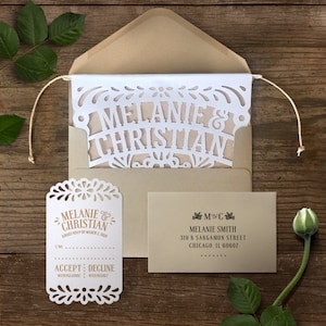 Papel Picado Wedding Invitation Banner and RSVP card from I Invite You. The invitation is composed of 3 hand cut paper flags emulating traditional Mexican papel picado decorations.