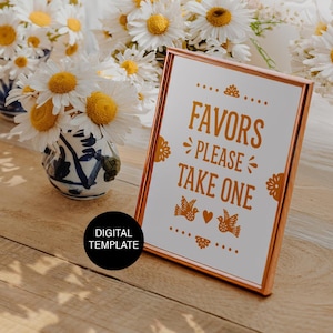 May include: A framed sign with the words "FAVORS PLEASE TAKE ONE" in orange lettering. The sign is surrounded by a copper-coloured frame. Daisies in small vases are in the background. A black circle with the words "DIGITAL TEMPLATE" is in the lower left corner.