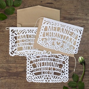 Papel Picado Wedding Invitation Banner and RSVP card from I Invite You. The invitation is composed of 3 hand cut paper flags emulating traditional Mexican papel picado decorations.