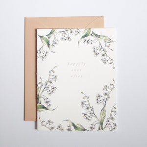 A2 plié joyeusement chaque après carte de vœux imprimée numériquement avec aquarelle du muguet