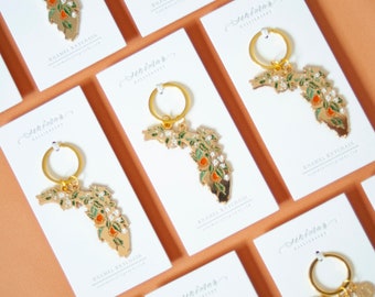 Guldfärgad Florida Orange Blossoms mjuk emaljnyckelring