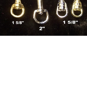 May include: Four metal clasps, two heavy-duty and two light-duty. The heavy-duty clasps are 1 5/8 inches and 2 inches in size. The light-duty clasps are 1 5/8 inches in size.