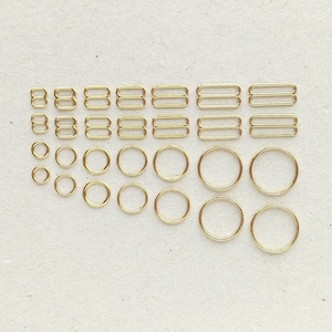 Gold bra making rings and sliders. Metal lingerie strap adjusters. 6-20 mm (1/4-13/16 in)