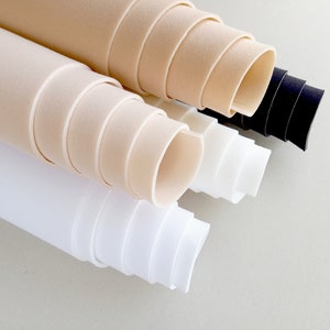 Laminated cut and sew bra making foam fabric. 3 mm (1/8 in) thick. Cotton jersey on one side. Sold by 1/4 m (0.27 yd)