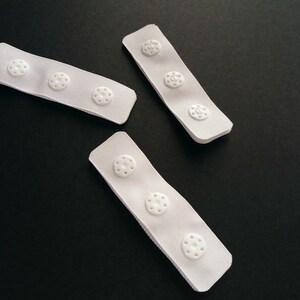 White plastic snap tape heat sealed edges