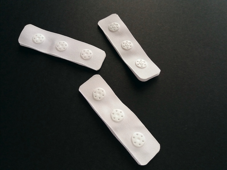 White plastic snap tape heat sealed edges