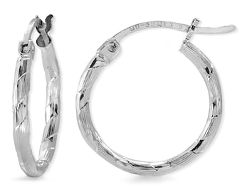 May include: A pair of silver hoop earrings with a textured, diamond-shaped pattern. The earrings have a hinged closure.