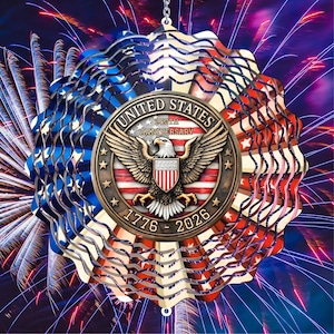 May include: A decorative wind spinner featuring a patriotic design. The spinner has a circular shape with alternating red, white, and blue sections, and a central medallion with an eagle emblem and the text "United States 250th Anniversary 1776-2026".
