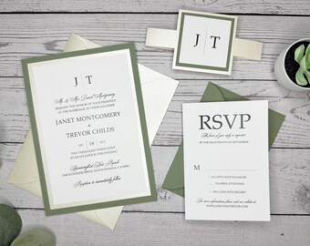 May include: A green and white wedding invitation with the couple's initials "JT" and the text "Janet Montgomery & Trevor Childs". The invitation includes the date, time, and location of the wedding. The RSVP card is also included with the text "RSVP" and the date by which to respond.